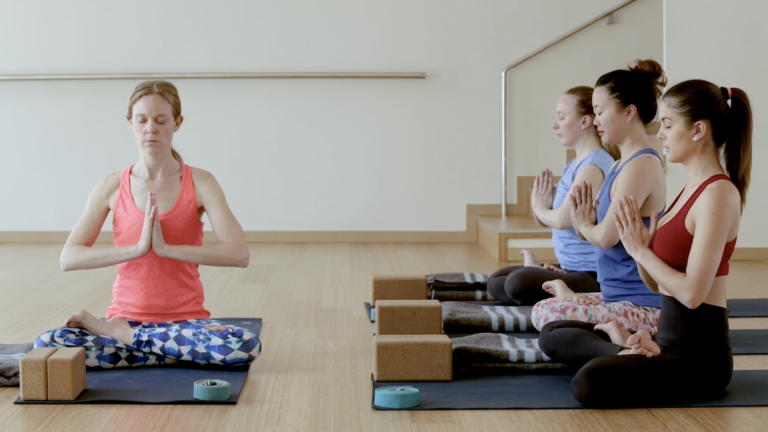 Photo of people doing yoga